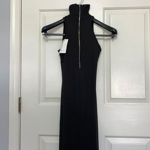 Solid black sleeveless maxi high collar maternity dress. 94% poly 6% spandex